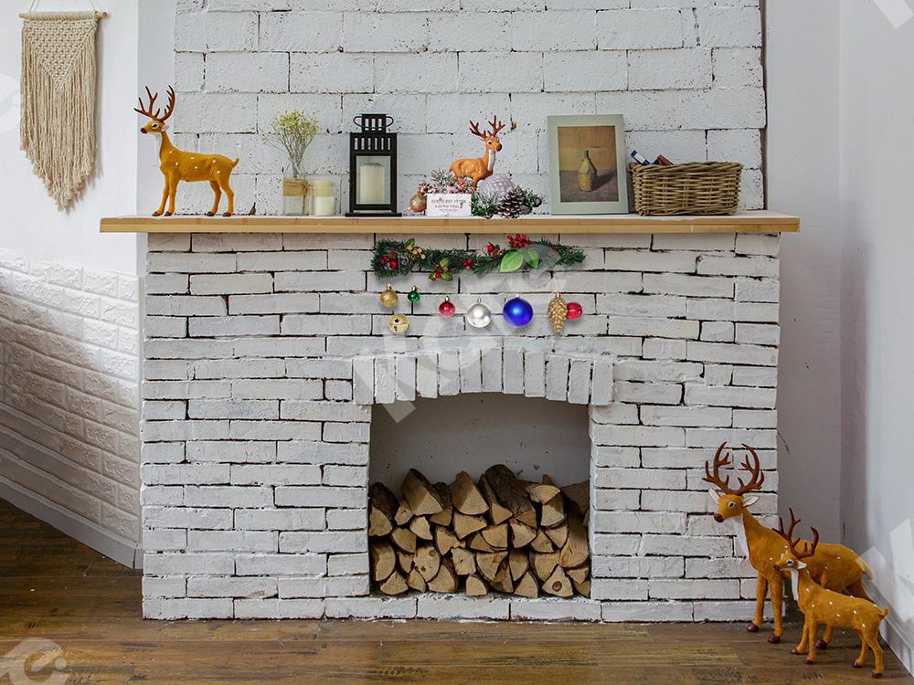 Kate Navidad como telón de fondo chimenea blanca diseñada por Jia Chan Photography