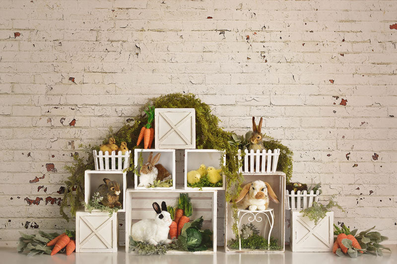 Kate Conejitos de Pascua con telón de fondo de ladrillo